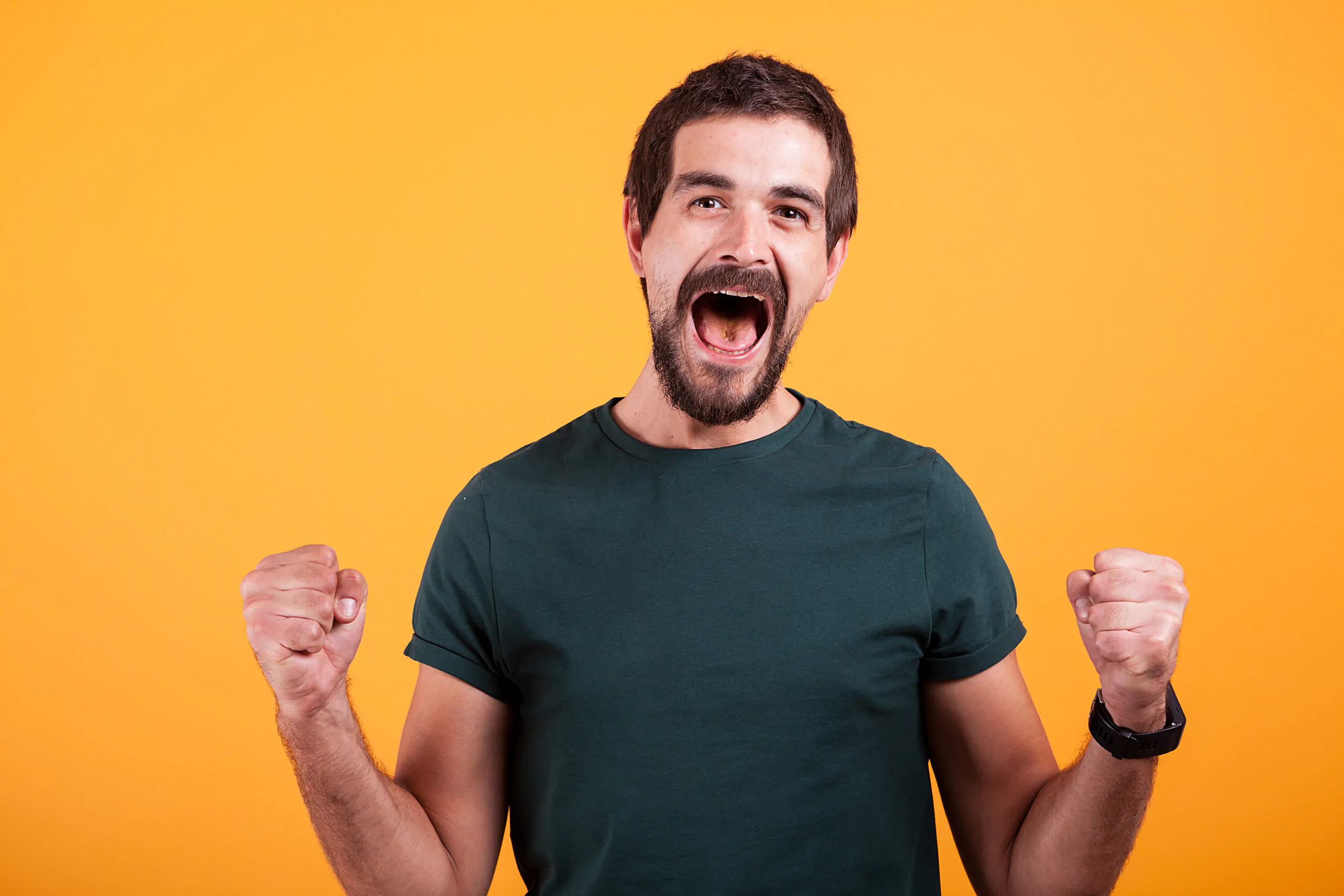 Joyful screaming excited man with his mouth open from emotions ley federal del trabajo